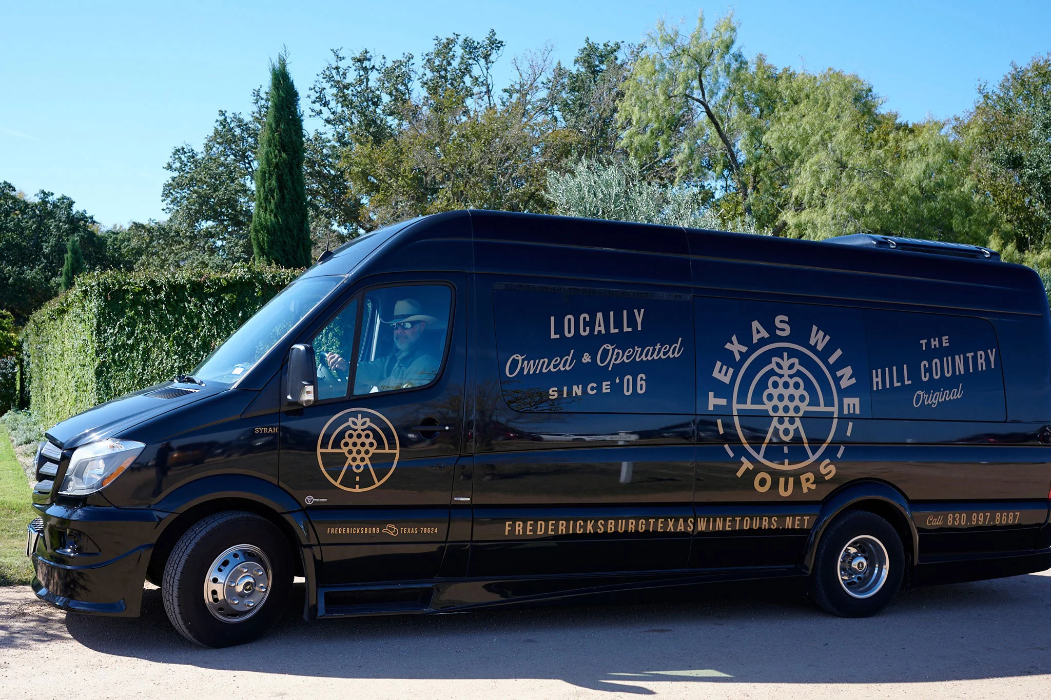 Some of the vehicles at Texas Wine Tours in Fredericksburg, TX.